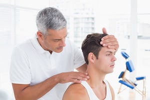 Doctor examining Face